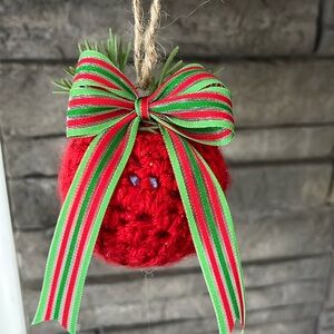 Handmade metallic crochet Christmas ornament.